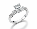 Moissanite ring with emerald-cut center stone