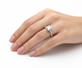 Princess Cut Moissanite Engagement Ring with Shoulder Set and Hidden Halo hand wearing - Franc Laurent