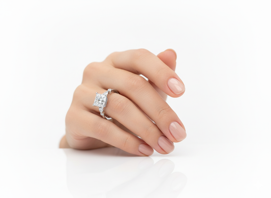 Princess Cut Moissanite Shoulder Set Ring featuring Hidden Halo hand wearing - Franc Laurent 