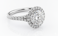 Round Cut Moissanite Engagement Ring with Halo and Split Shank