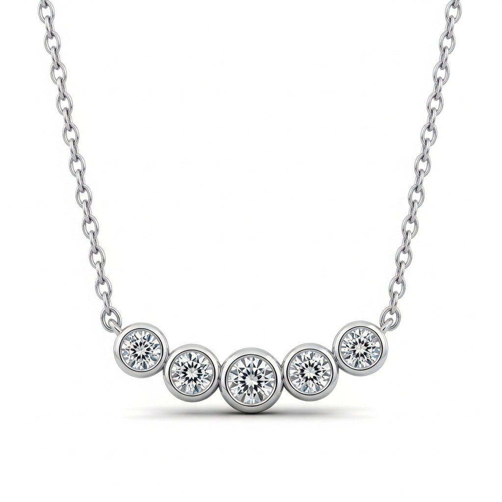 Silver necklace with five stones on a white background