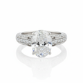 Oval Cut Moissanite Engagement Ring with Pave Stone Set Shoulders Vintage Design